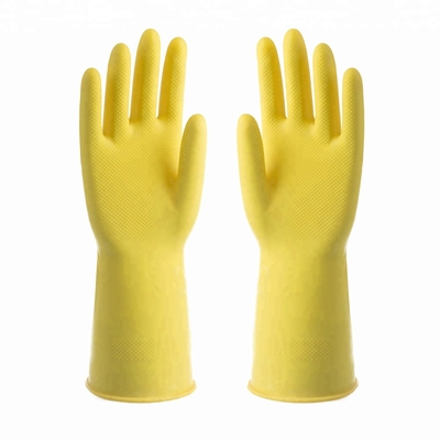 El guante de limpieza impermeable del hogar del látex se reúne alineando guantes resistentes químicos del látex